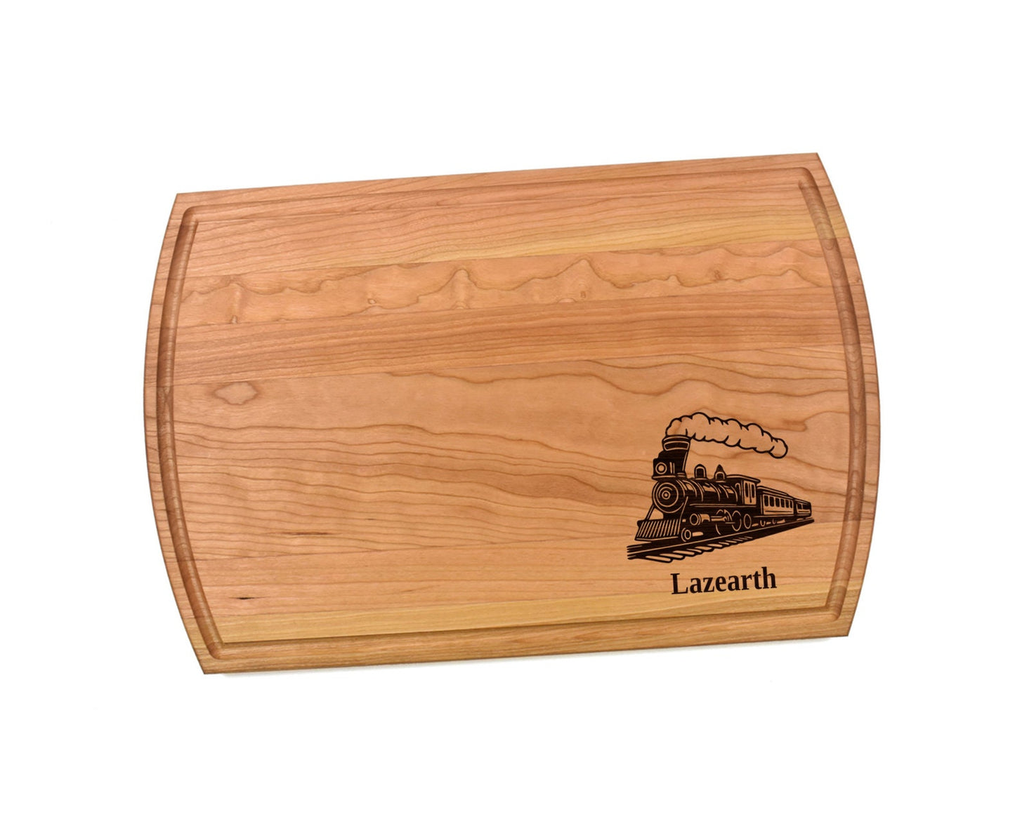 May include: A wooden cutting board with a brown train and the name Lazearth engraved on it.