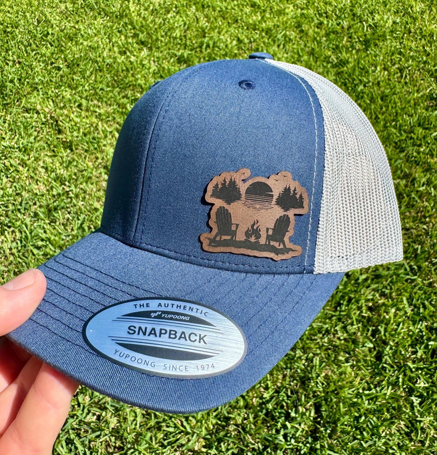 Sunset Campfire  Hat – Trucker Snapback Cap – Adirondack Chairs & Forest Scene – Outdoor Adventure Gift – Nature Lover Hat