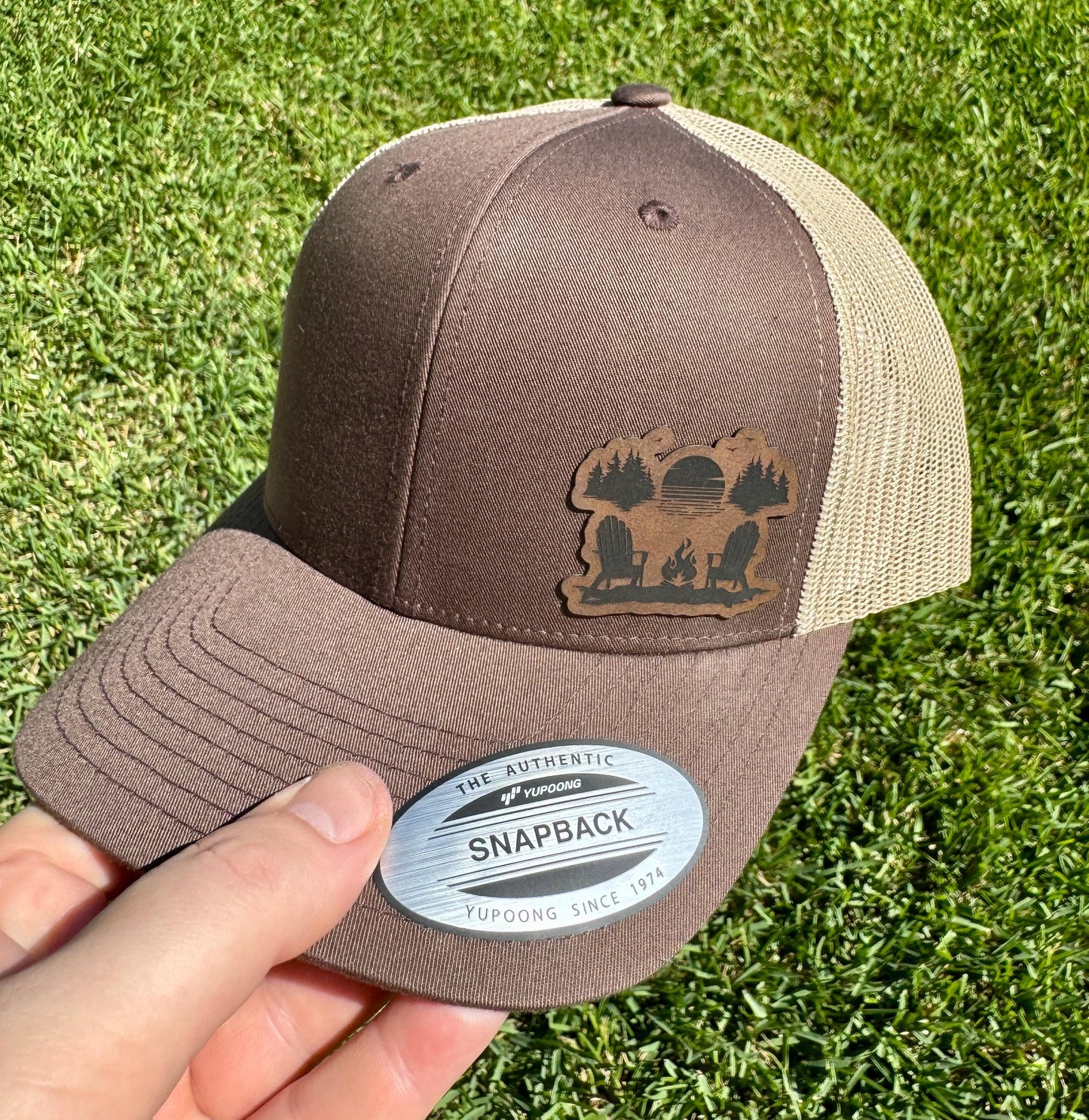 Sunset Campfire  Hat – Trucker Snapback Cap – Adirondack Chairs & Forest Scene – Outdoor Adventure Gift – Nature Lover Hat