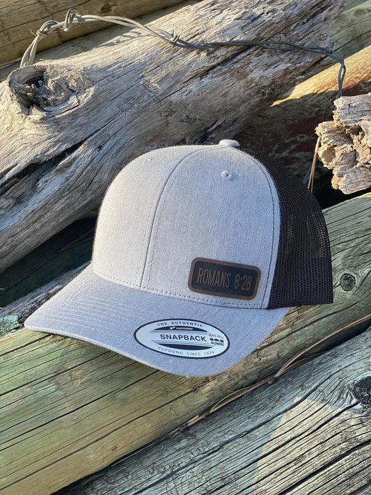 Romans 8:28 Bible Verse Hat – Snapback Trucker Hat with Patch – Christian Hat – Faith-Based Cap – Gift for Him or Her – Scripture Hat