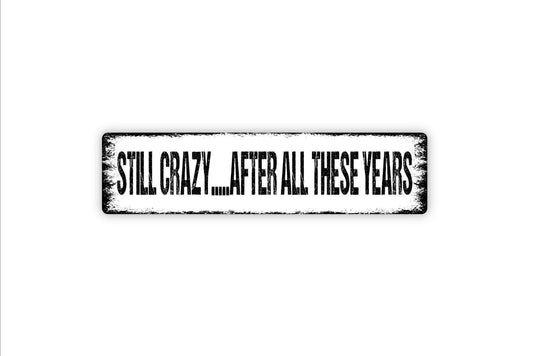 Still Crazy After All These Years Sign - Funny Vinyl Sticker Or  Metal Street Sign or Door Name Plate Plaque